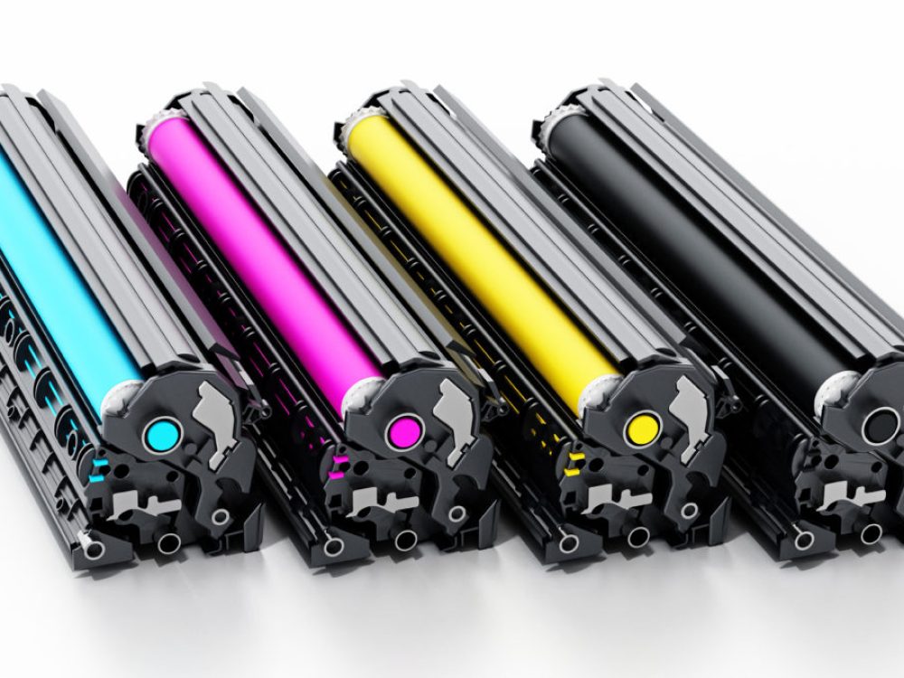 Stack of laser printer CMYK toners. 3D illustration.